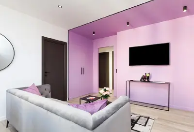a living room with purple walls and a couch at 3 Bed - Ascenseur - 2 min du Palais - Climatisé in Cannes