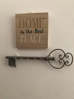 a home is the best place sign on a wall at ORION in Cannes