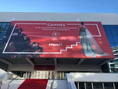 a large billboard on the side of a building at ORION in Cannes