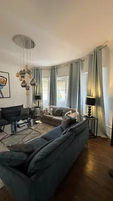 a living room with two couches and a table at Maison de ville à Cannes à 450 mètres de la Croisette in Cannes
