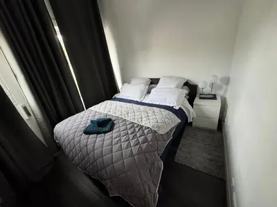 a white bathroom with a sink and a toilet at Maison de ville à Cannes à 450 mètres de la Croisette in Cannes