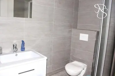 a bathroom with a white sink and a toilet at Beautiful studio Cannes Center in Cannes
