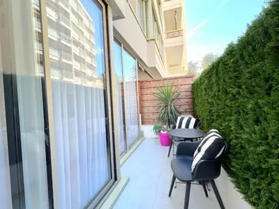 a patio with two chairs and a table on a balcony at Marema appartement, by Welcome to Cannes in Cannes