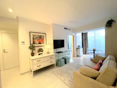 a living room with a couch and a tv at Marema appartement, by Welcome to Cannes in Cannes
