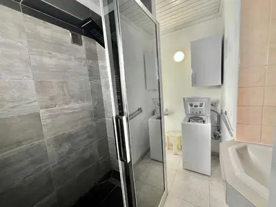 a bathroom with a shower and a toilet and a sink at Louise appartement, by Welcome to Cannes in Cannes