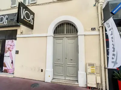 a building with a gray door on the side of it at 2 bedroom Majestic, 1 min to the Croisette 357 in Cannes