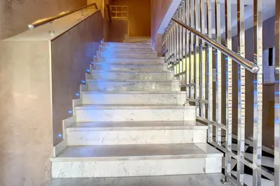 a set of stairs in a building at HENRI CAMILLE REAL ESTATE - Rouaze 2 -Studio à 50m center in Cannes