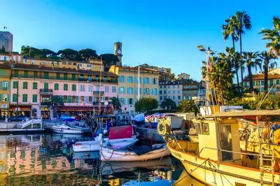 a group of boats docked in a harbor with buildings at Cannes Palm Beach Top Floor Terrace ! SAINT JAMES in Cannes