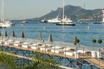 a group of boats are docked in the water at HENRI CAMILLE REAL ESTATE - Rouaze - Studio 50m Croisette in Cannes
