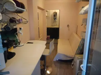 a room with a desk and a chair in a room at Studette Cannes centre in Cannes