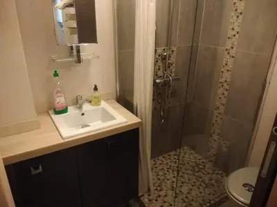 a bathroom with a shower and a sink at Studette Cannes centre in Cannes
