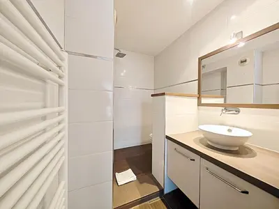a bathroom with a sink and a mirror at Viva Riviera Studio General Ferrié in Cannes