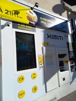 an atm machine on the side of a street at Le St Nicolas in Cannes