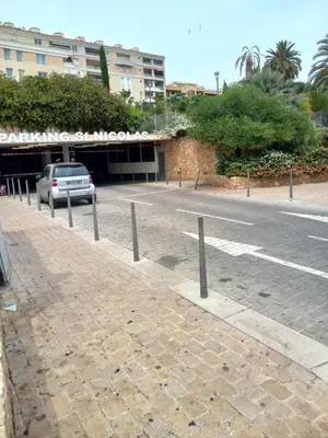 a car parked on the side of a street at Le St Nicolas in Cannes