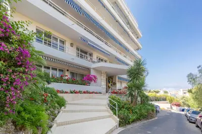a building with flowers on the side of it at Florida 35m studio with sea views close to the Croisette in Cannes