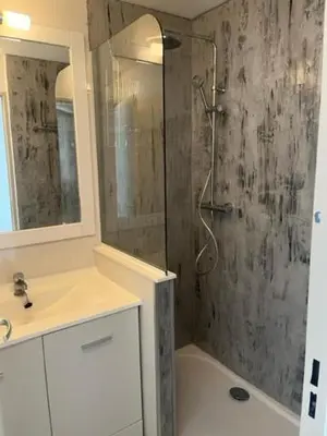 a bathroom with a shower and a sink at Fantastic located studio in Cannes
