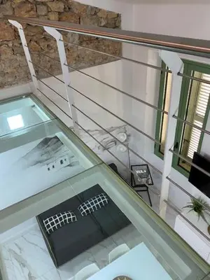 an overhead view of a building with a glass floor at Sunflower apartments in Cannes