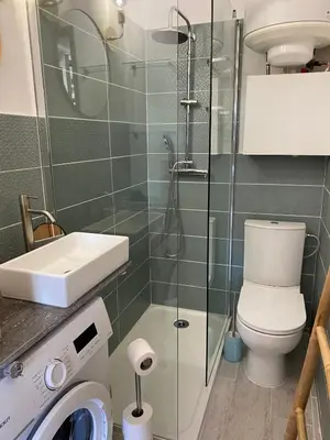 a bathroom with a shower and a toilet and a sink at Secret Garden ideal for Congrès and Holidays LIVE IN LE FLORENCE in Cannes