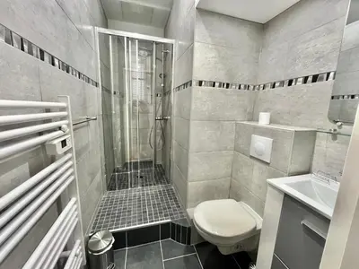 a bathroom with a shower and a toilet at Cannes Suquet by Welcome to Cannes in Cannes