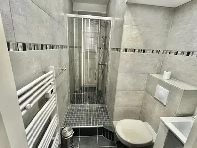 a bathroom with a shower and a toilet at Cannes Suquet by Welcome to Cannes in Cannes