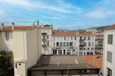 a view of a city with white buildings at Cosy Studio, Cannes centre in Cannes