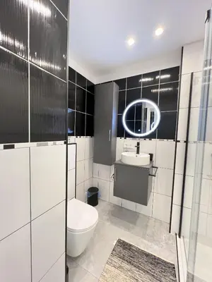 a bathroom with a toilet and a sink at Maryline by Welcome to Cannes in Cannes