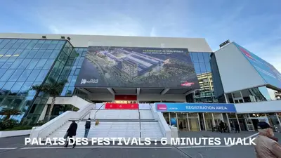 a building with a large billboard on the side of it at Super Central Cannes - all comfort - Calm in Cannes