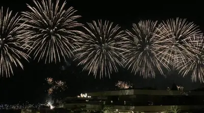 a group of fireworks exploding in the sky at night at LOFT CROISETTE VUE Mer in Cannes