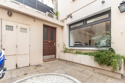 a store front of a building with a window at LB Vacation Rentals I Duplex Commandant Andre 65m2 I Casa d'Azur in Cannes