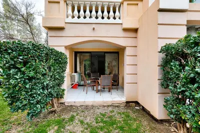 a house with a patio with a table and chairs at Résidence Cannes Villa Francia - maeva Home - Studio 4 personnes - Confort MAE-9944 in Cannes