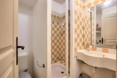 a bathroom with a toilet and a sink and a shower at Résidence Cannes Villa Francia - maeva Home - Appartement 3 pièces 7 personnes - Sélection MAE-0244 in Cannes