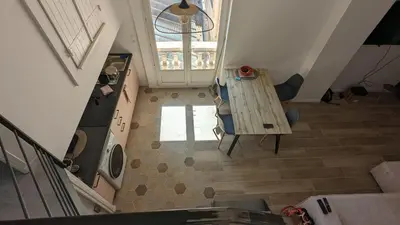 an overhead view of a kitchen and a living room at Appartement T3 , 650m du Palais des Festivals in Cannes
