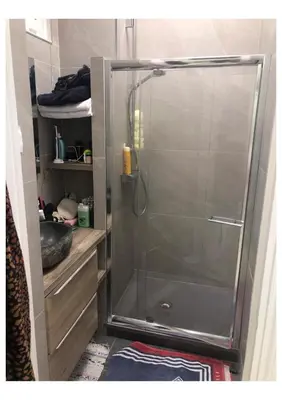 a shower with a glass door in a bathroom at Centre heart of CAnnes in Cannes