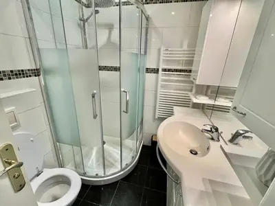 a bathroom with a shower and a toilet and a sink at Rouaze 2, by Welcome to Cannes in Cannes