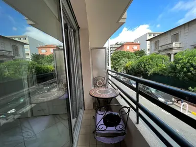 a balcony with a table and a view at Rouaze 2, by Welcome to Cannes in Cannes