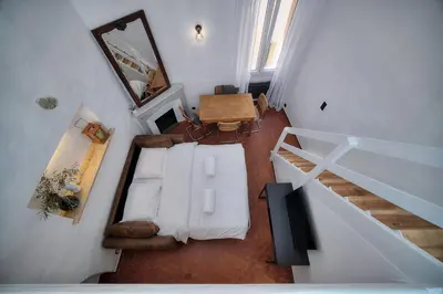 an overhead view of a living room with a couch at IMMOGROOM - Cosy - Renovated duplex - Close to the beach in Cannes
