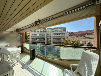 a balcony with a view of a building at Cannes center 2, by Welcome to Cannes in Cannes