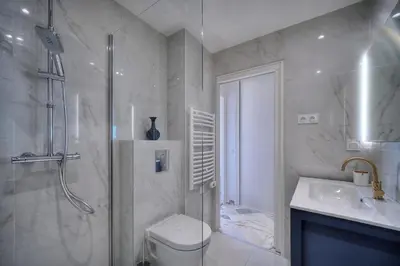 a bathroom with a shower and a toilet and a sink at Somptueux 2 chambres vue MER, TERRASSE, PARKING A2B232 in Cannes