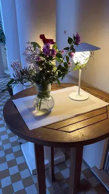 a white bedroom with a bed and a mirror at Viva Riviera Unique Apartment with Terrace and Secret Garden Croisette in Cannes