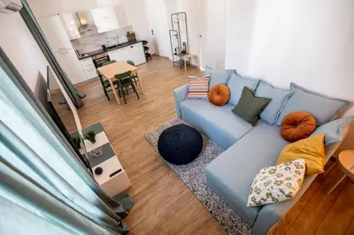 an overhead view of a living room with a blue couch at Montgolfiere Apartment by Connexion in Cannes