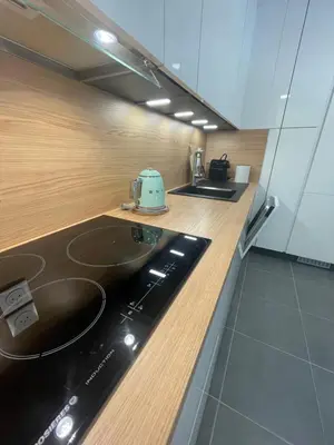 a kitchen with a toaster sitting on top of a counter at Cannes, appartement avec parking+terrasse, Croisette à pied! in Cannes