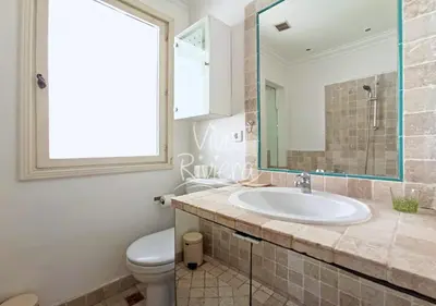 a bathroom with a sink and a toilet at Viva Riviera Central 1 Bedroom Place Gambetta in Cannes
