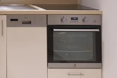 a kitchen with an oven and a counter top at Cannes: superbe appartement de type T2 pour 4 pers in Cannes