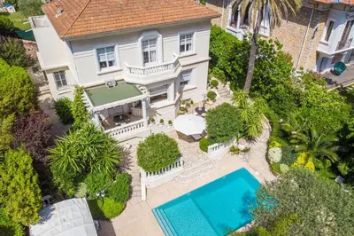 an aerial view of a house with a swimming pool at Cannes Luxury Rental - Belle epoque villa to rent close to Cannes center in Cannes