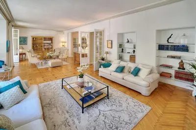 a living room with two couches and a coffee table at Cannes Luxury Rental - Belle epoque villa to rent close to Cannes center in Cannes