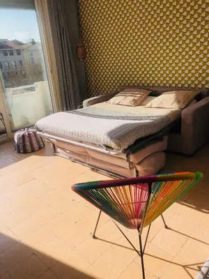 a bed sitting on top of a chair in a room at Croisette Beach Cannes Banane 4 sleeps Apart in Cannes