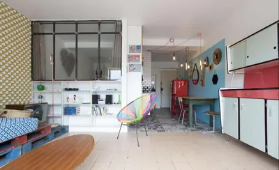 a kitchen with a table and a dining room at Croisette Beach Cannes Banane 4 sleeps Apart in Cannes