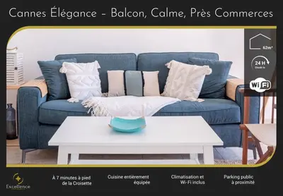 a blue couch in a living room with a coffee table at Cannes Elegance – Balcony & Quiet Near Shops in Cannes