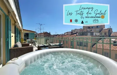 a hot tub on the balcony of a building at Duplex Luxury Toîts du Soleil By SCLS Locations in Cannes