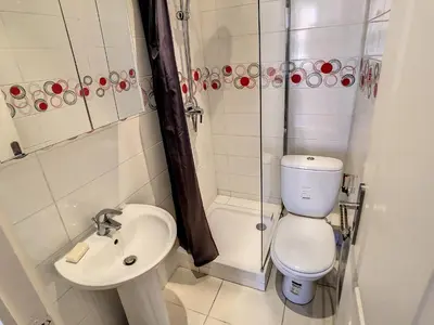 a bathroom with a toilet and a sink and a shower at Studio Carré d'Or. 2 mins from the Croisette. 143 in Cannes